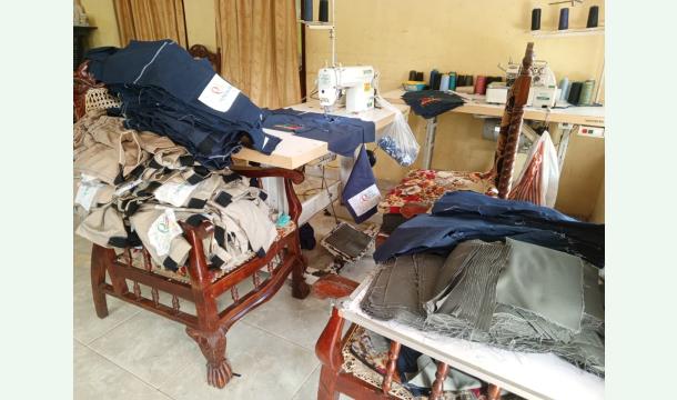 Cover To purchase land for my sewing business and to build a shop for the sewing business on the land.