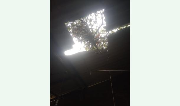 Cover Fixing the broken roof of my house