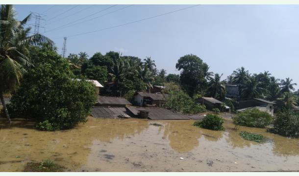 Cover Providing assistance to the people displaced by the floodwaters.