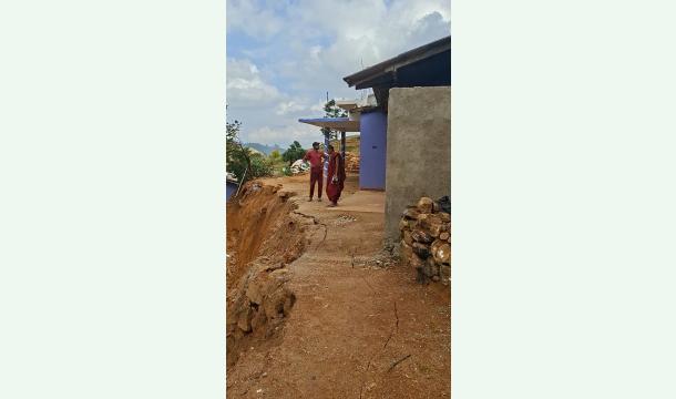 Cover "We will rise again," "Together we stand," and rebuilding "brick by brick, heart by heart," #Rebuild...