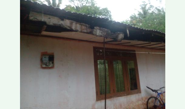 Cover To repair a dilapidated roof by covering it with roofing sheets