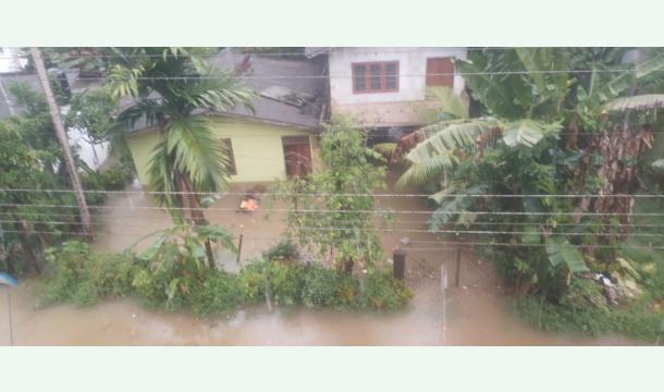 Cover Giving exercise books for school children those who are affected from heavy flood