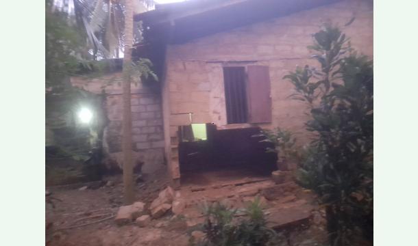 Cover The house was flooded and damaged.