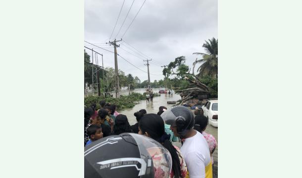 Cover To assist those affected by the floods