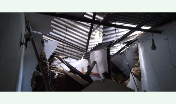 Cover To rebuild a destroyed house