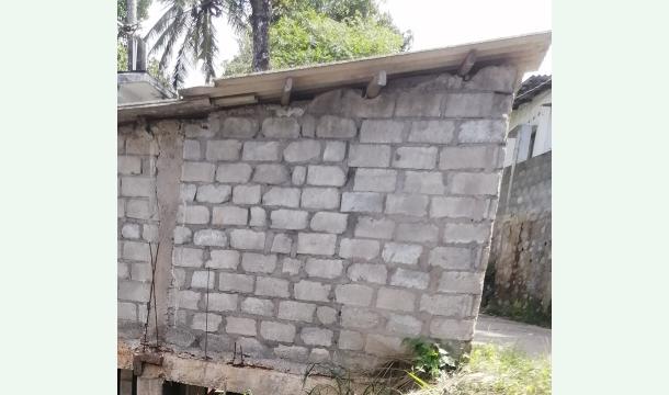 Cover To rebuild a dilapidated house.