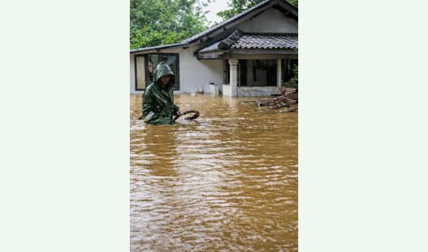 Cover Due to heavy rain and flooding, my home is under water.