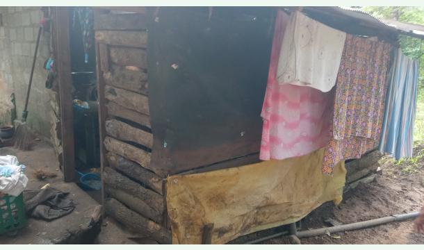 Cover Please build our helpless home .I don't have money to fix my house, please help me quickly.