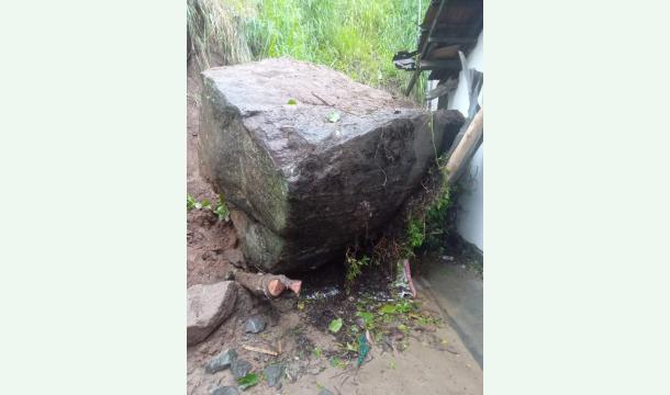 Cover Repairing a broken house and buying land